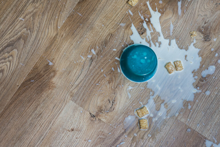 Kids cereal spilled on floor