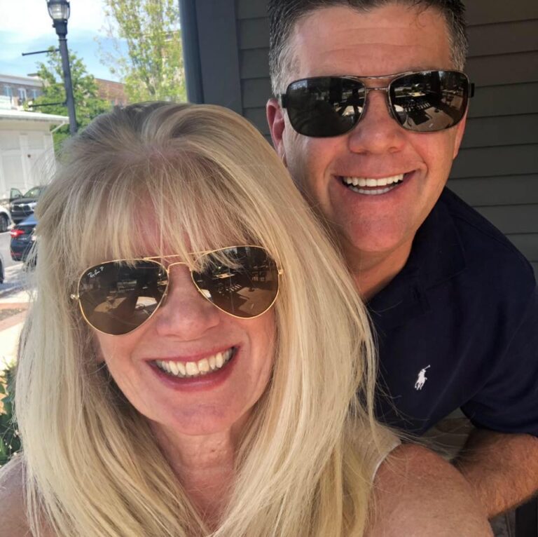 Portrait of two people wearing sunglasses
